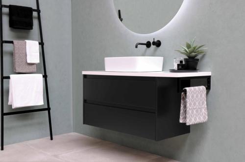 Bathroom with Black weightless cabinet